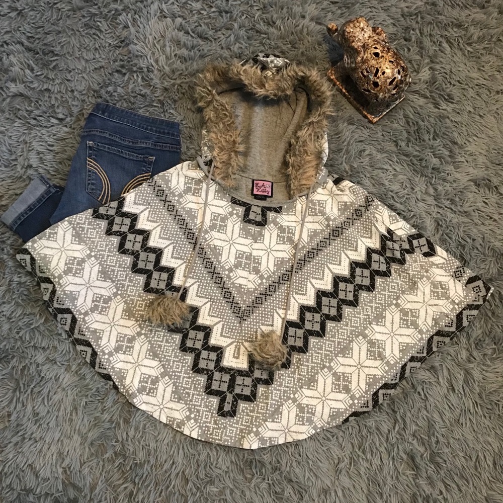 Gray white and black poncho.